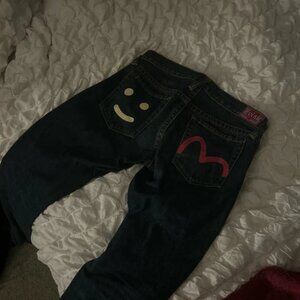 Dark wash pink and white low waisted 2000s evisu jeans